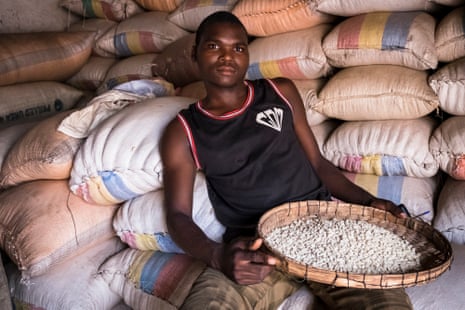 Maize trader Carrington Mwanda, in Nsanje market, Malawi
