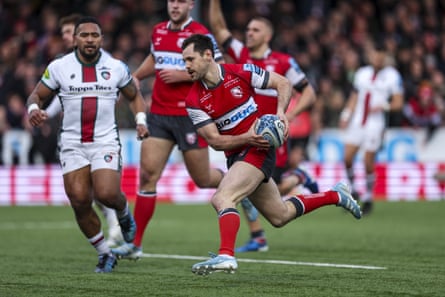 Tomos Williams scores a try for Gloucester.
