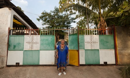 Mireille Ain, a French manbo (Vodou priestess), in front of her peristyle in Jacmel, on the southern coast of Haiti.