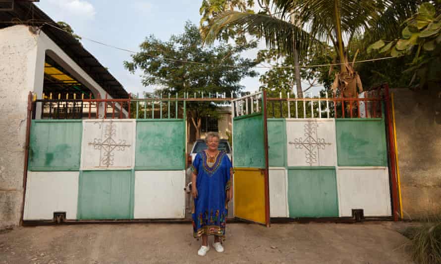Mireille Ain, a French manbo (Vodou priestess), in front of her peristyle in Jacmel, on the southern coast of Haiti.