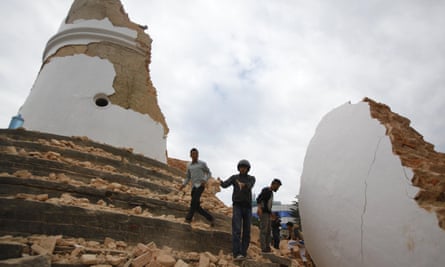 Volunteers remove debris at the historic Dharahara tower