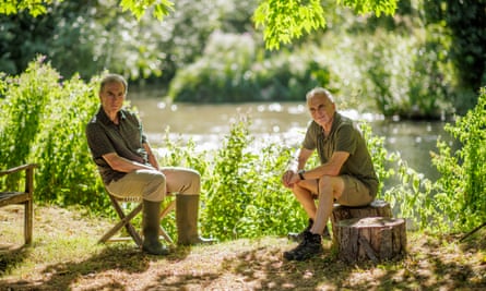 Peter Hammond left and his neighbour Ashley Smith by the River Windrush in the Cotswolds