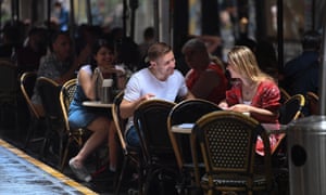 People dine outdoors in Melbourne