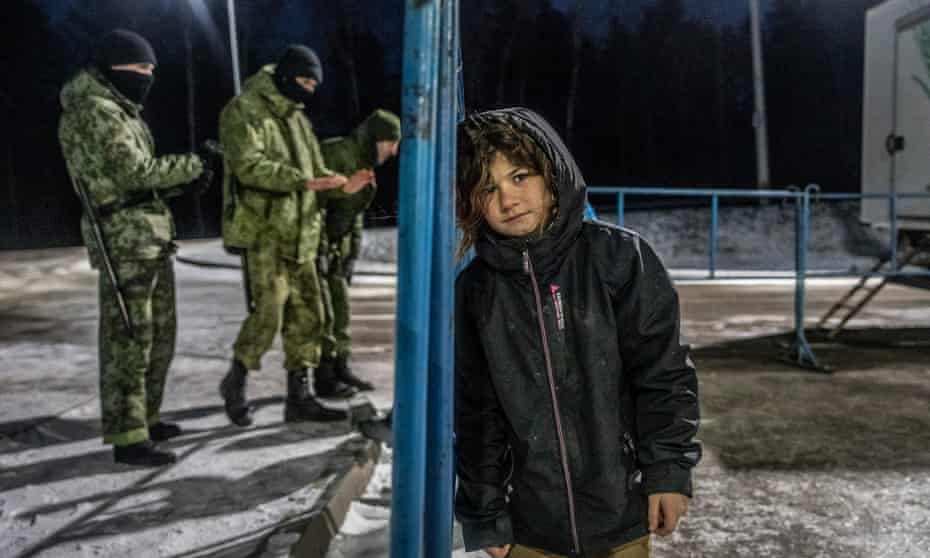 A girl from Syria at the warehouse in Bruzgi, Belarus