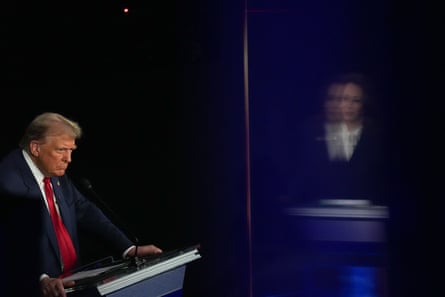 a man and a woman stand at lecterns