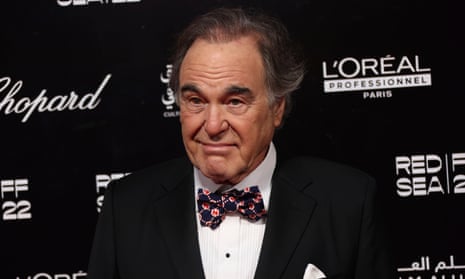 Oliver Stone poses for photographers upon arrival at a opening gala ceremony