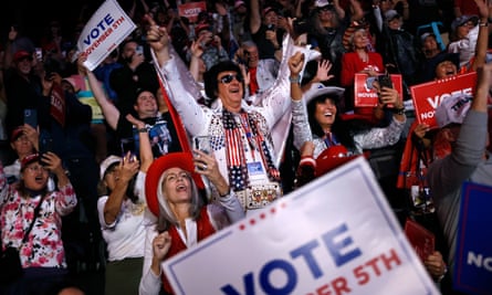 A man dressed as Elvis Presley cheers for Republican presidential nominee, former President Donald Trump at a rally in Nevada.