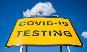 A traffic sign saying 'Covid-19 testing'