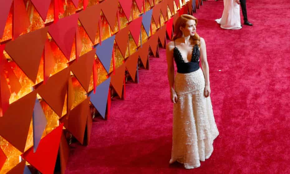 Actor Emma Roberts at the 89th annual Academy awards in 2017 wearing a vintage Armani gown.