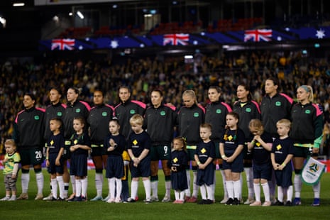 The Matildas line up for the national anthem