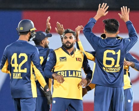 Wanindu Hasaranga of Sri Lankla celebrates taking the wicket of Jos Buttler of England.
