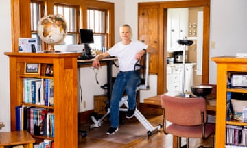 DIY-CLIMATE-GREGORY<br>CLIVE, IOWA - APRIL 20, 2024: Jim Gregory poses for a portrait with his pedal-powered work station at his home in Ames, Iowa on Thursday, April 25, 2024. 
CREDIT: KC McGinnis for The Guardian