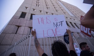 People demonstrate after marching to protest against Trump administration immigration and refugee policies on 18 June 2018 in Los Angeles, California.