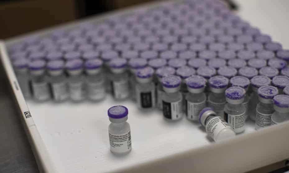 Frozen vials of the Pfizer/BioNTech Covid-19 vaccine are taken out to thaw, at the MontLegia CHC hospital in Liege, Belgium. 