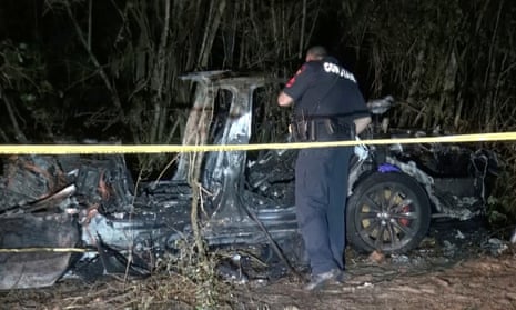 The remains of a Tesla vehicle are seen after it crashed in The Woodlands, Texas, April 17, 2021, in this still image from video obtained via social media. Video taken April 17, 2021. SCOTT J. ENGLE via REUTERS  ATTENTION EDITORS - THIS IMAGE HAS BEEN SUPPLIED BY A THIRD PARTY. MANDATORY CREDIT.