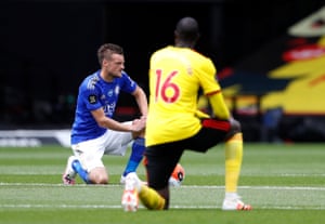 Jamie Vardy of Leicester City and Abdoulaye Doucoure of Watford takes a knee in support of the Black Lives Matter movement.