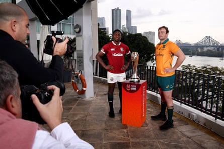 Maro Itoje and Harry Wilson pose with the trophy in Brisbane.