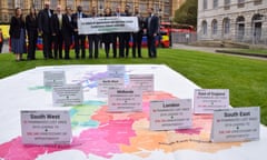 A map highlights the number of pharmacies closed as campaigners from the Association of Independent Multiple Pharmacies protest outside parliament in London