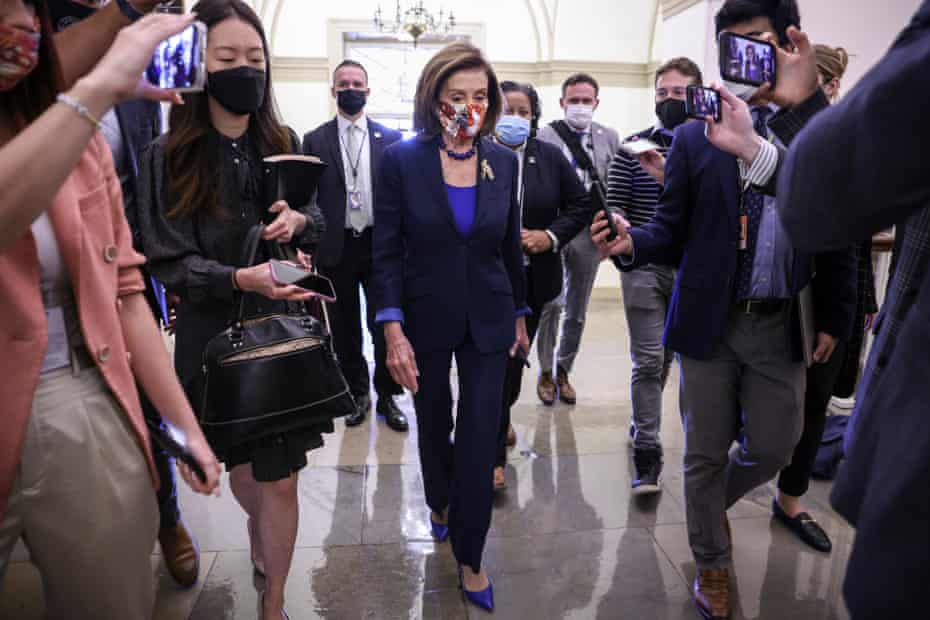 Nancy Pelosi arrives at the US Capitol on Friday as talks continue.
