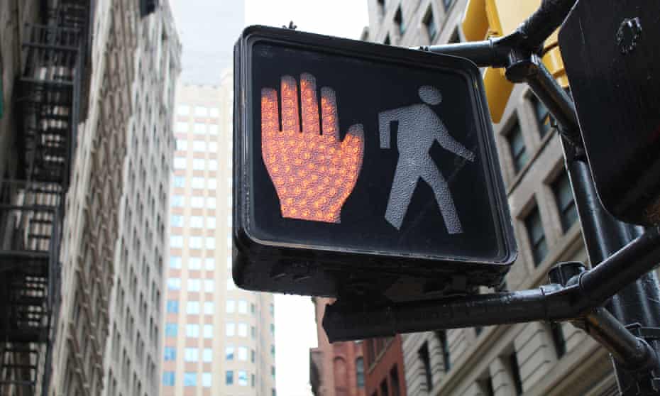 Pedestrian crossing sign in New York City