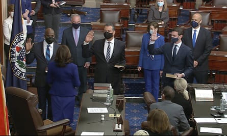 Kamala Harris swears in Raphael Warnock, Alex Padilla and Jon Ossoff on the floor of the Senate.