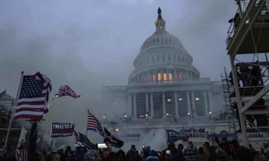 Security forces respond with teargas after a mob of Trump supporters breached the US Capitol on Wednesday.