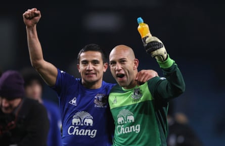 Tim Cahill and Tim Howard celebrate after beating Manchester City in 2010.