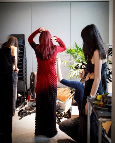 Models try on outfits at the casting for the show ahead of London fashion week.