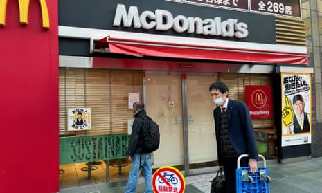 A closed McDonald's restaurant as the company said it halted operations due to a system disruption, in Tokyo.