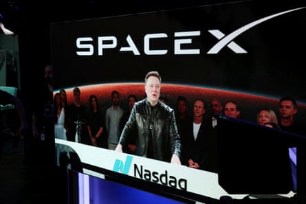 Elon Musk speaks via video link on the day of SpaceX’s initial public offering at the Nasdaq