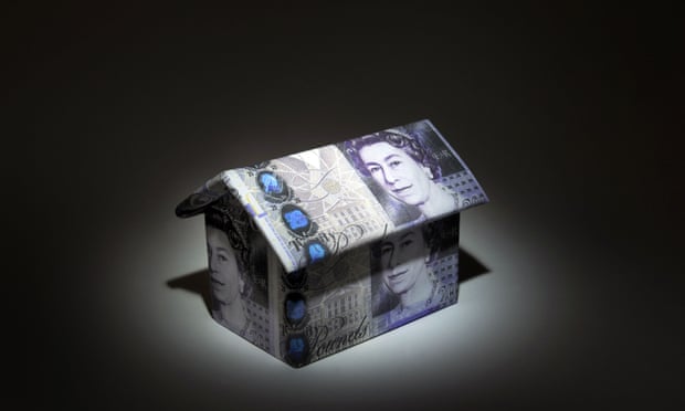 Model of house covered in sterling £20 notes