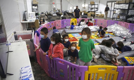 Unaccompanied migrant minors aged 3 to 9 inside a playpen at the US Customs and Border Protection facility in Donna, Texas.