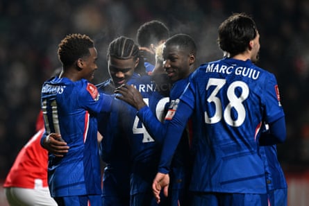 Jorrel Hato with Jamie Gittens (right) after scoring Chelsea’s first goal against Charlton