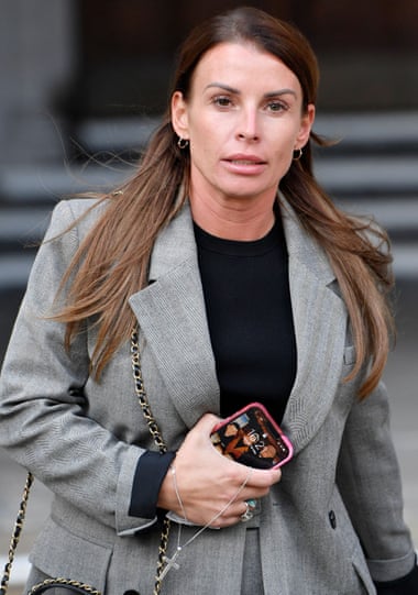 Coleen Rooney leaves court during the trial.