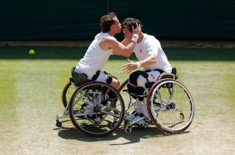 Alfie Hewittcelebrates matchpoint by kissing the forehead of his partner Gordon Reid.