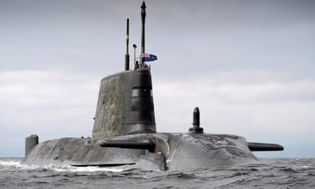 Surfaced submarine at sea