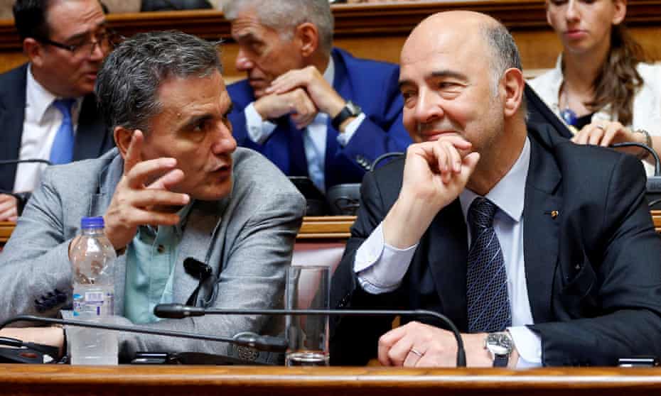 The Greek finance minister Euclid Tsakalotos, left, in Athens this July with Pierre Moscovici, European commissioner for economic affairs. 