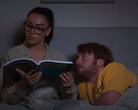 Woman and man in bed