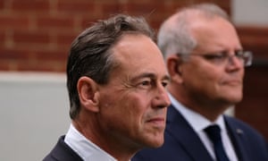 Australia prime minister Scott Morrison (right) and the federal health minister Greg Hunt (left) during a visit to CSL in Melbourne on Friday, where the AstraZeneca vaccine is being produced.