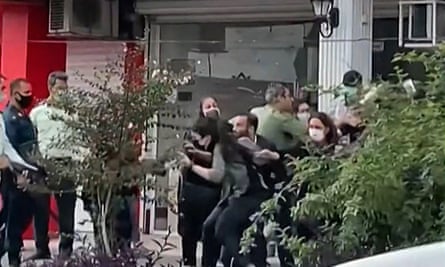 A screengrab from a video filmed in October 2022 shows female protesters being roughly handled by Iranian security forces in Iran’s northern Gilan province.