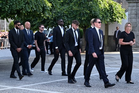 Arne Slot arrives with Liverpool players and coaching staff for the funerals of Diogo Jota and André Silva.