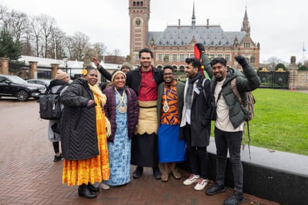 Representatives from small Pacific island states gather outside the International Court of Justice