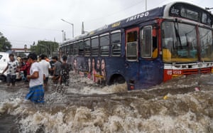 Mumbai, India
A public bus makes its way on a flooded road after heavy monsoon rains