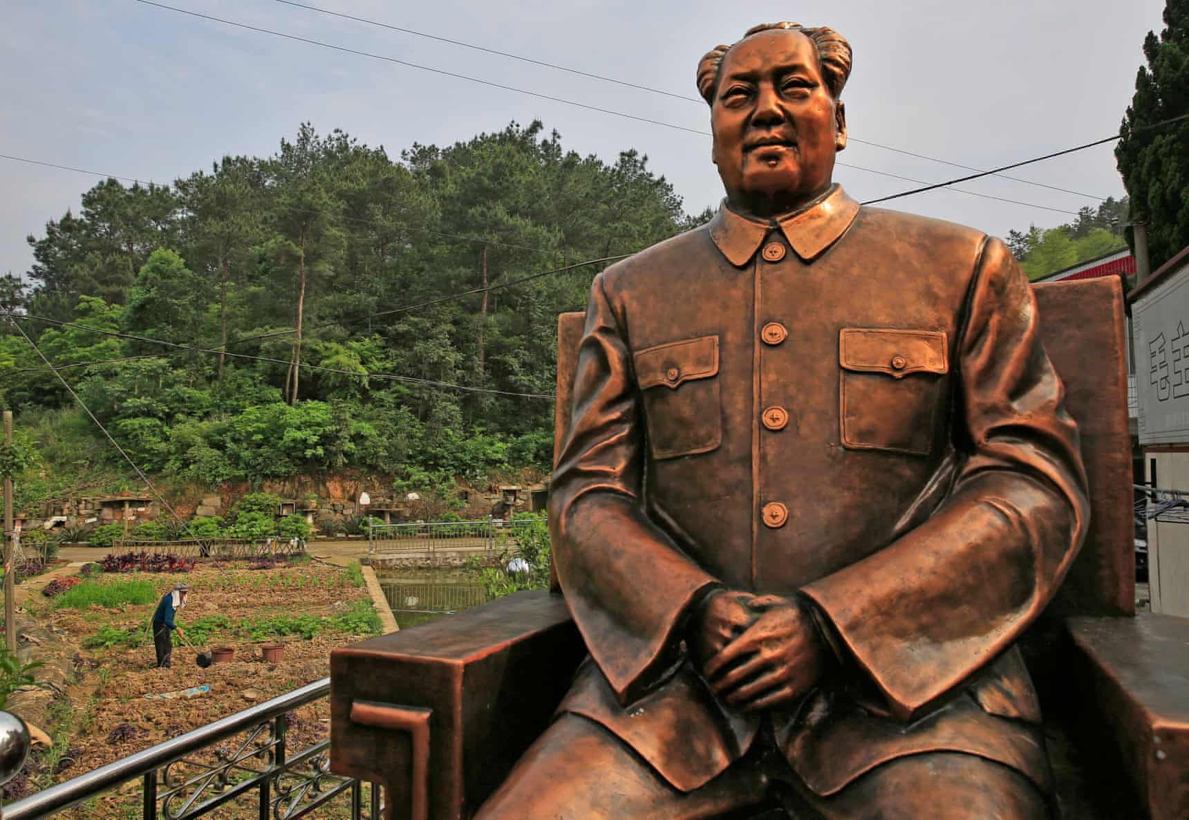 A four-metre tall statue of Mao Zedong beside farmland in Shaoshan, Hunan province, in 2016.