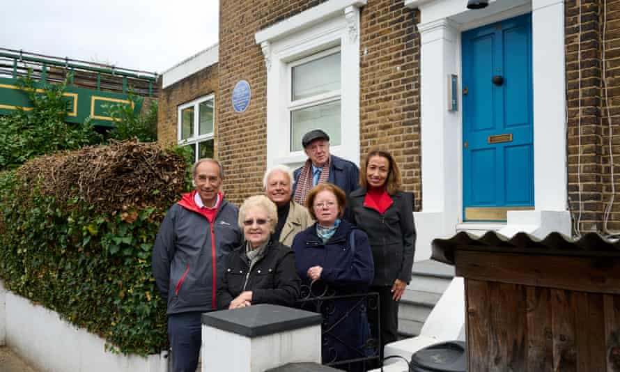 The Crafts' great-grandchildren standing outside the house.