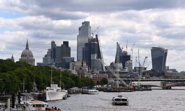 The City of London in London, as stocks and the pound slide