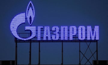 A Gazprom sign is seen on the facade of a business centre in St Petersburg