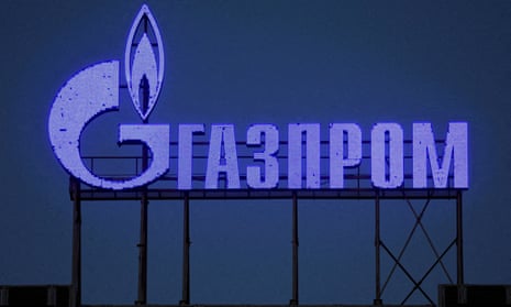 A Gazprom sign is seen on the facade of a business centre in St Petersburg