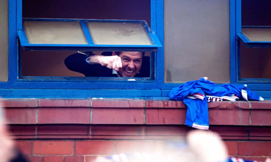 Steven Gerrard celebrates Rangers’ title triumph in March with fans gathered outside Ibrox.