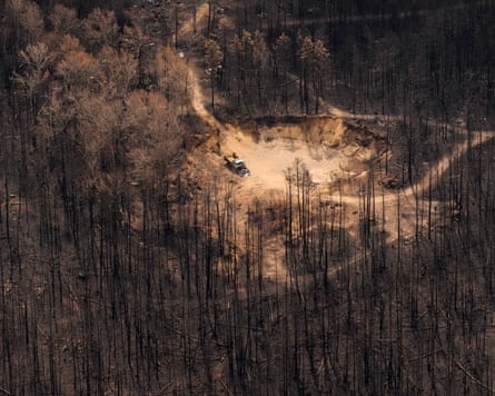 Canada Climate WildfiresWildfire damage is pictured from the air in the immediate area surrounding Collins First Nation, a small, remote Ojibwa community located in northwestern Ontario, about 250 kilometers (155 miles) north of Thunder Bay, Ontario, Canada, on Wednesday, July 22, 2026. (Chris Young/The Canadian Press via AP)